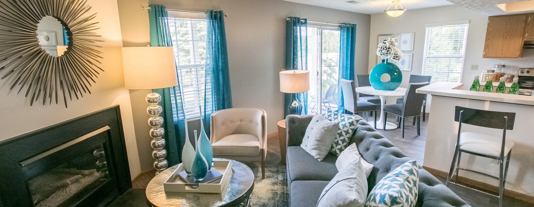 living room with a couch coffee table and fireplace