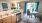 a kitchen with a table and chairs