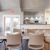 a large kitchen with a dining table