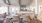 a large kitchen with a dining table