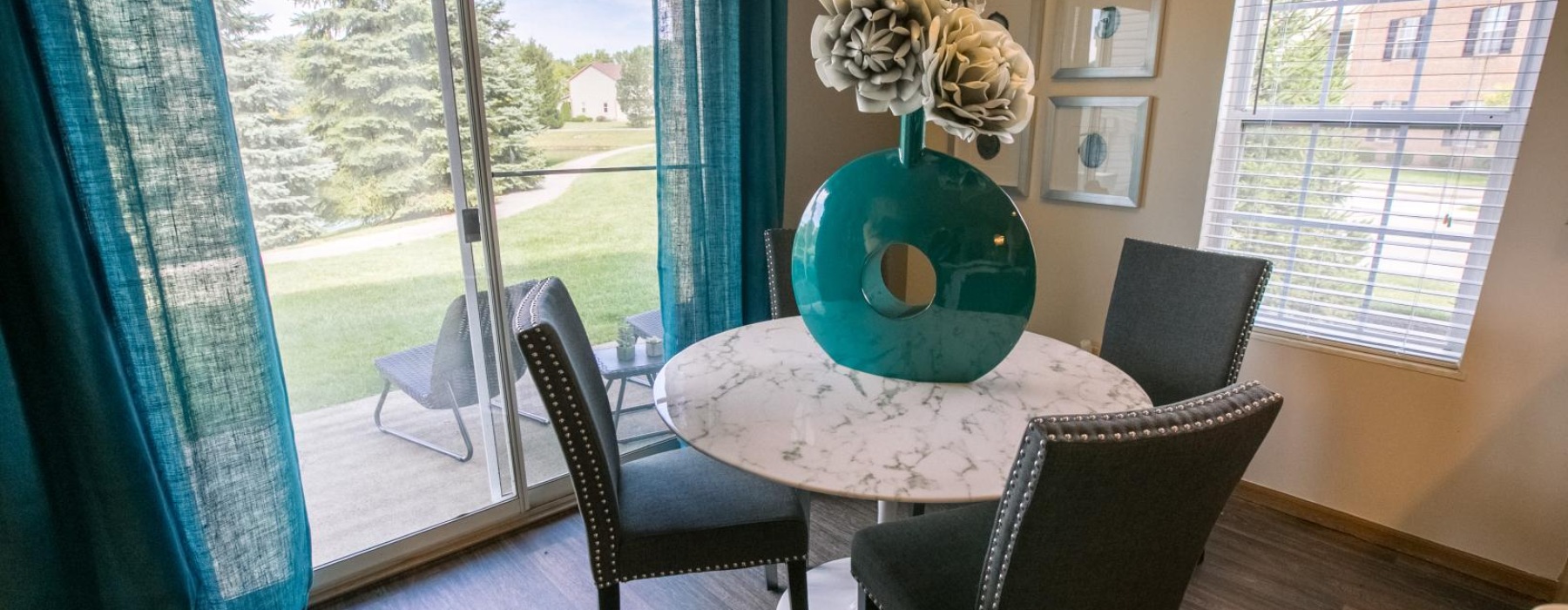 a dining room table with chairs